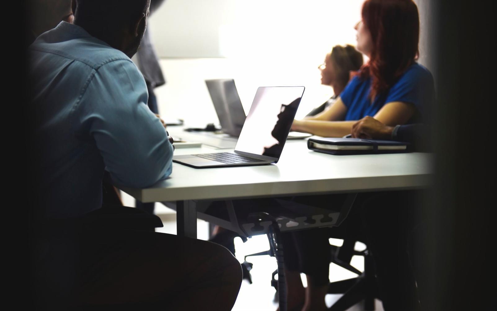 Collaborative workspace demonstrating team-based financial planning approach